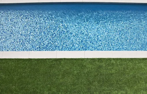 Artificial grass as pool deck in a Gilbert AZ swimming pool